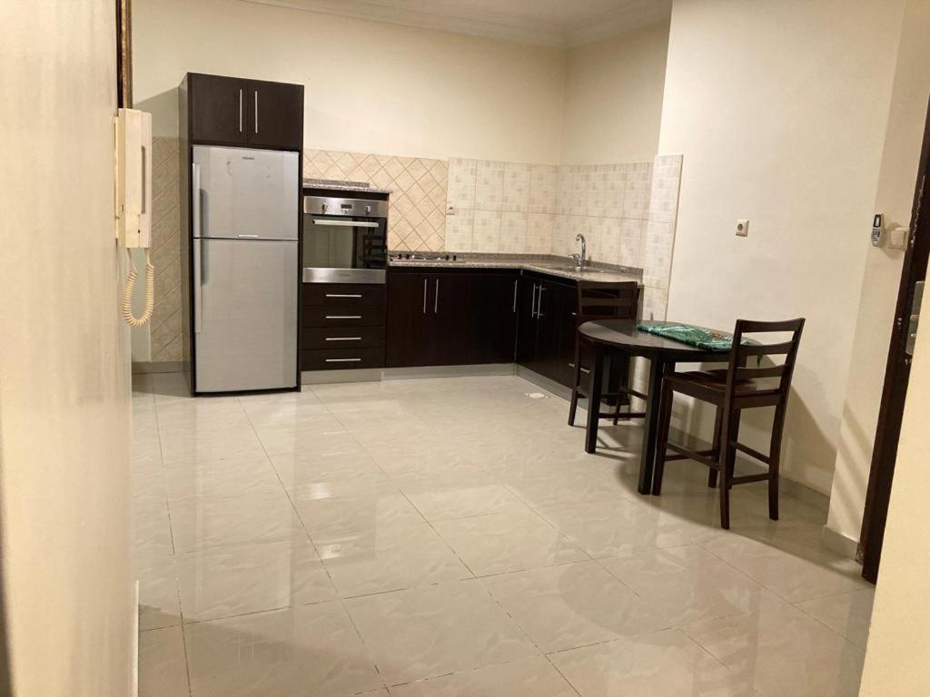 Uptown Hotel Apartment Аман Екстериор снимка