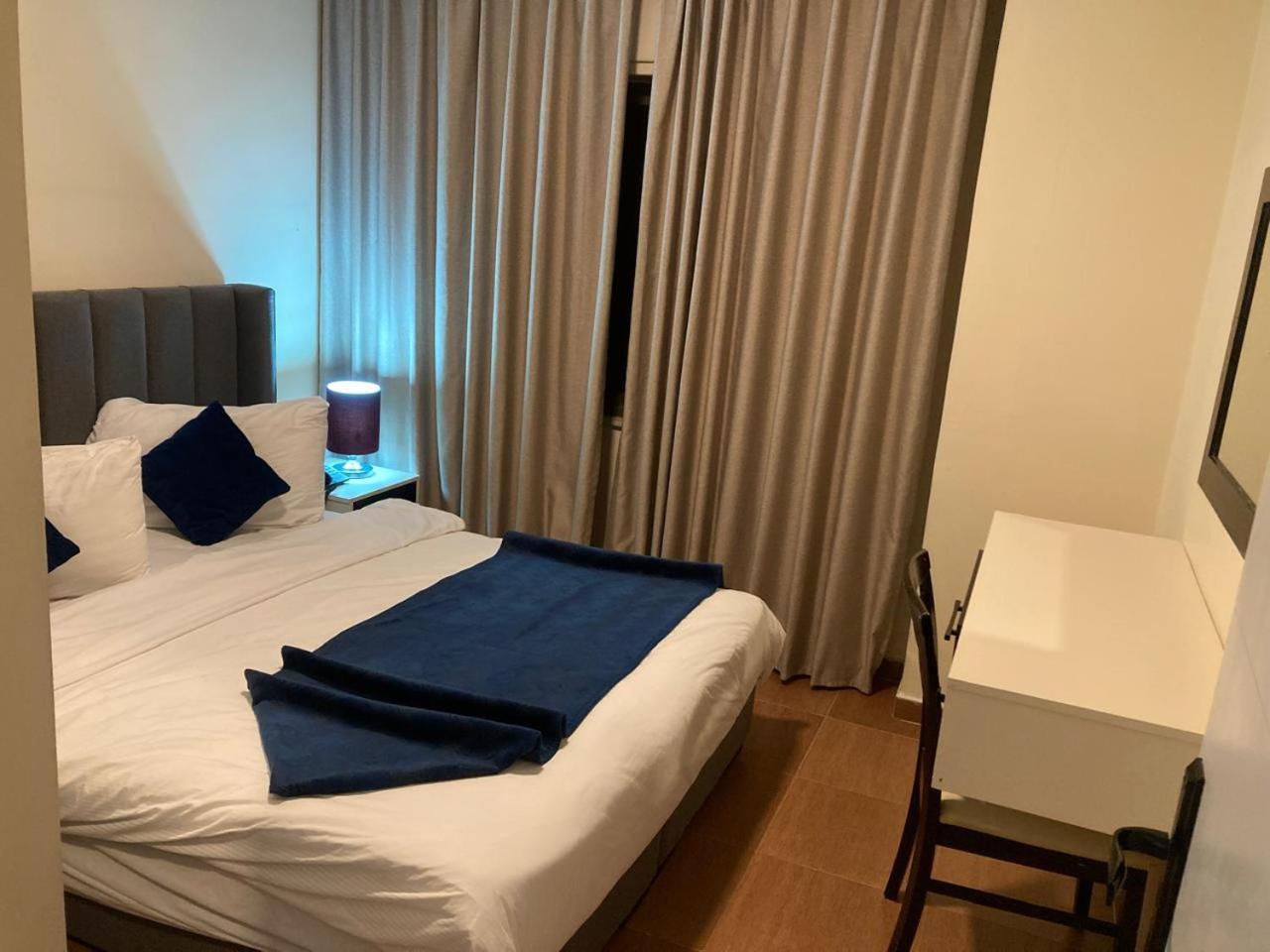 Uptown Hotel Apartment Аман Екстериор снимка