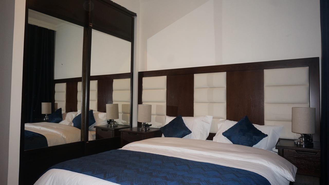 Uptown Hotel Apartment Аман Екстериор снимка
