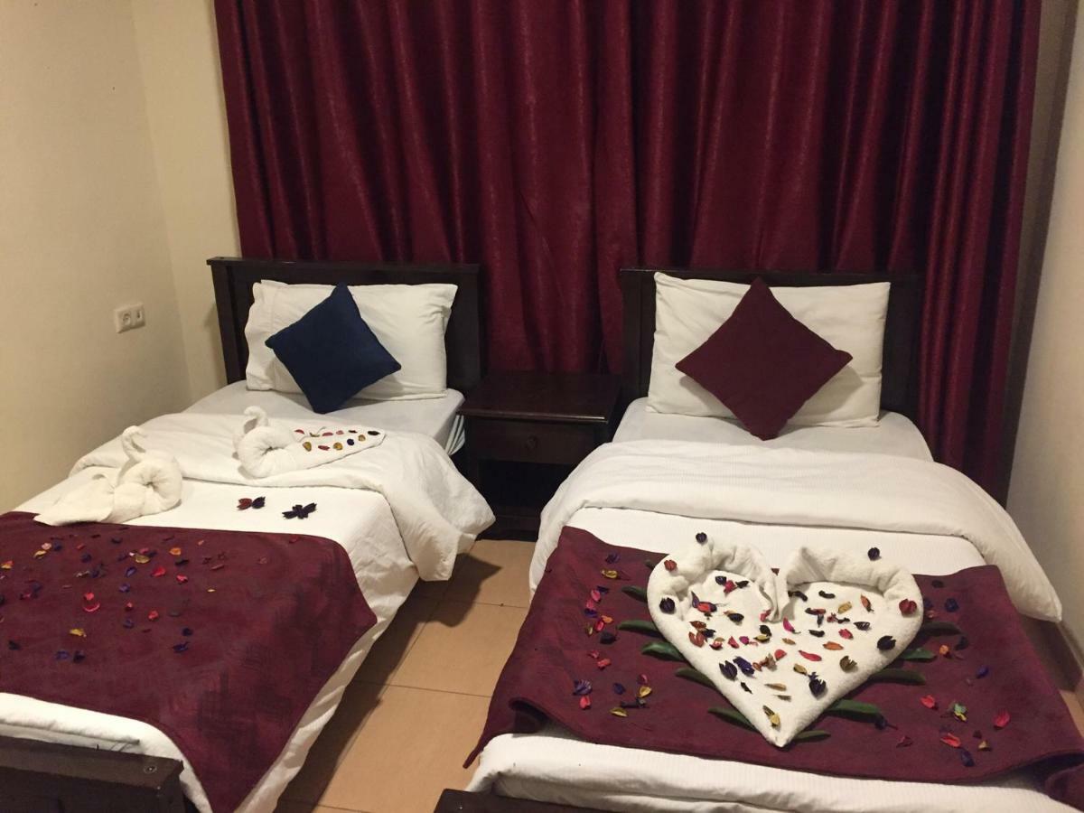 Uptown Hotel Apartment Аман Екстериор снимка