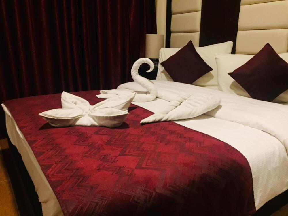 Uptown Hotel Apartment Аман Екстериор снимка