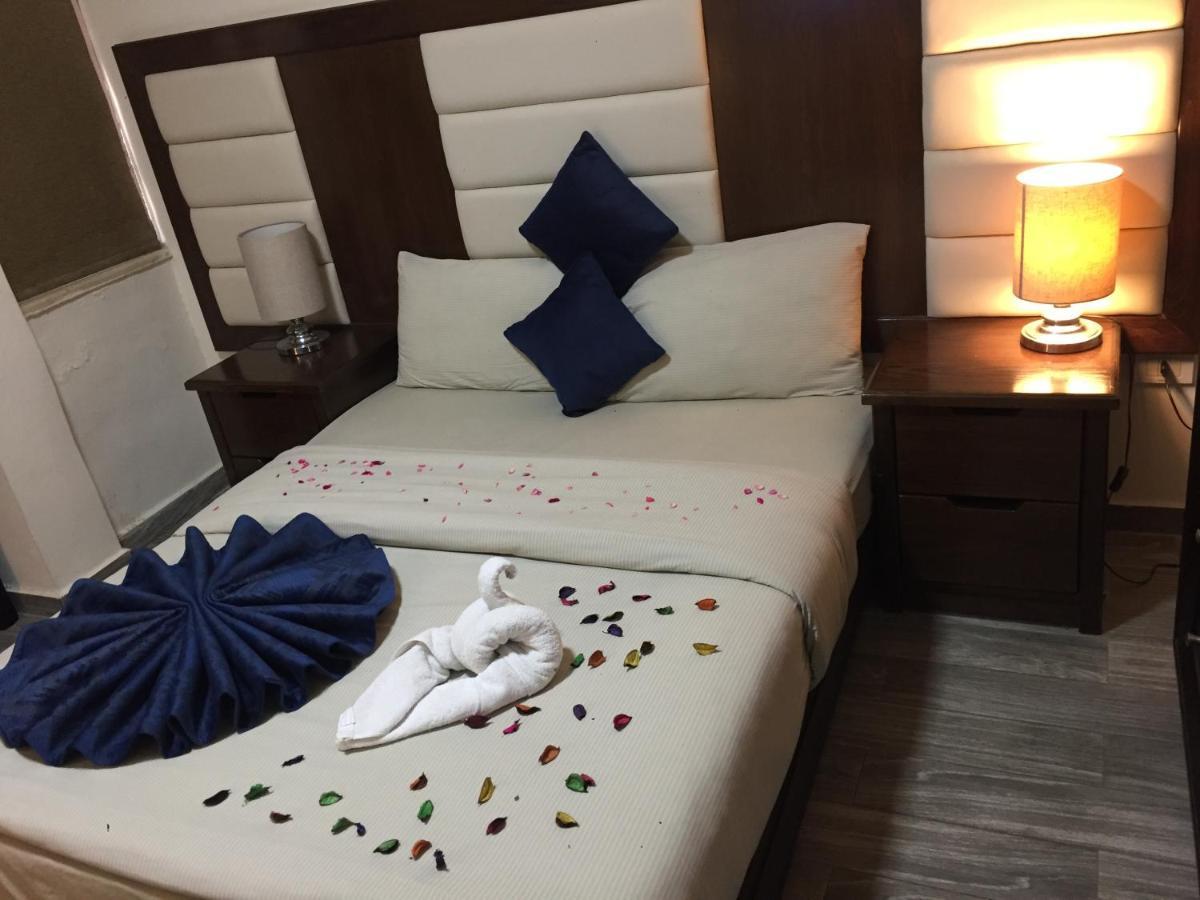 Uptown Hotel Apartment Аман Екстериор снимка